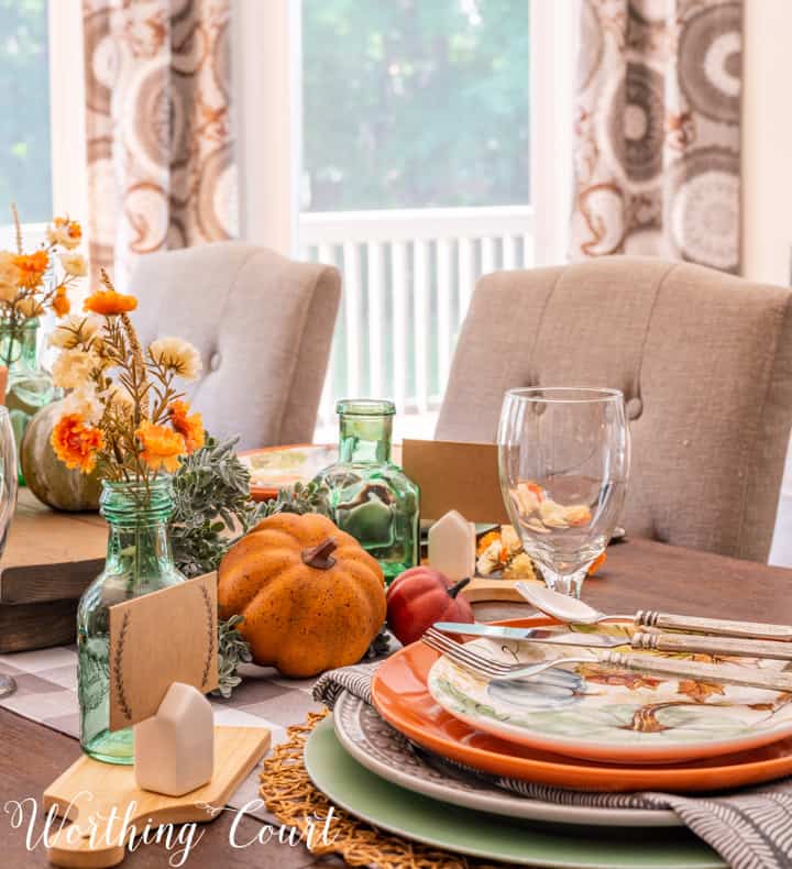 Thanksgiving table set with traditional fall colors and elements