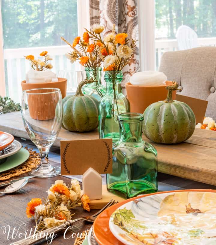 Thanksgiving table set with traditional fall colors and elements