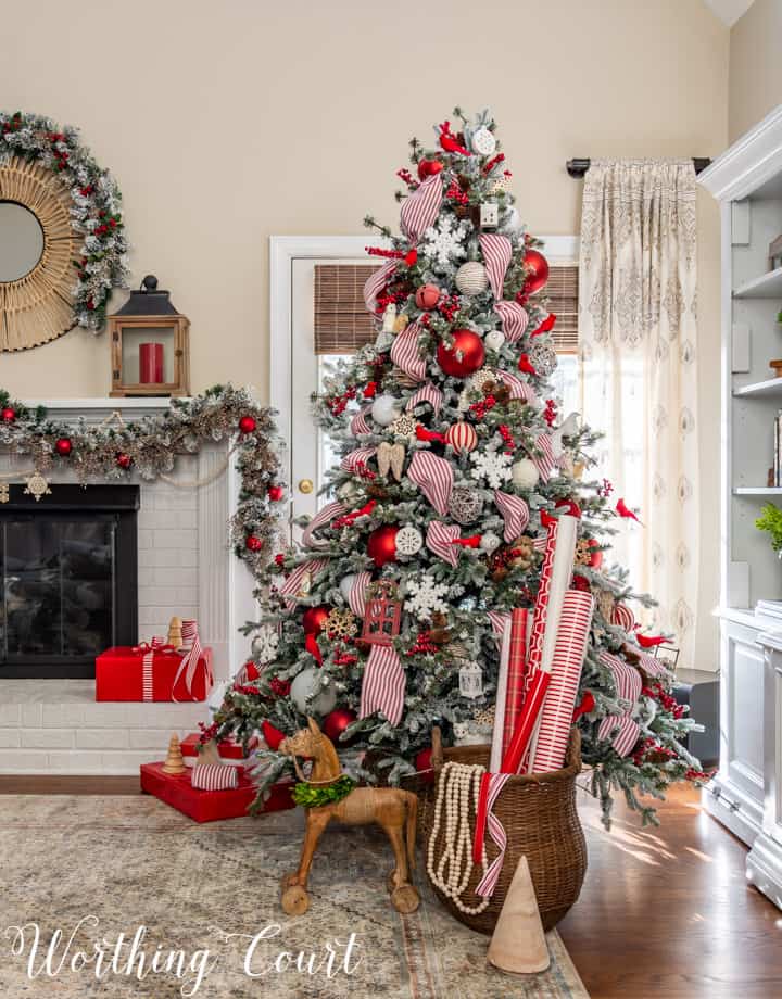 flocked Christmas tree with red and white decorations