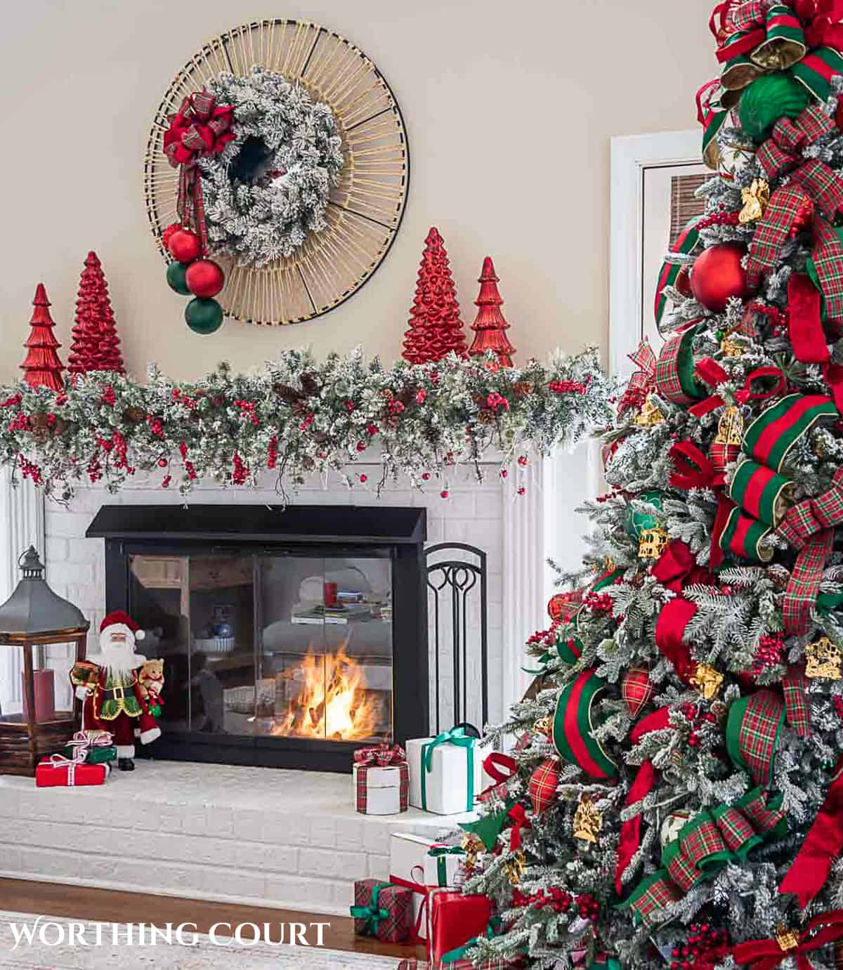 white brick fireplace beside Christmas tree with red and green decorations for Christmas