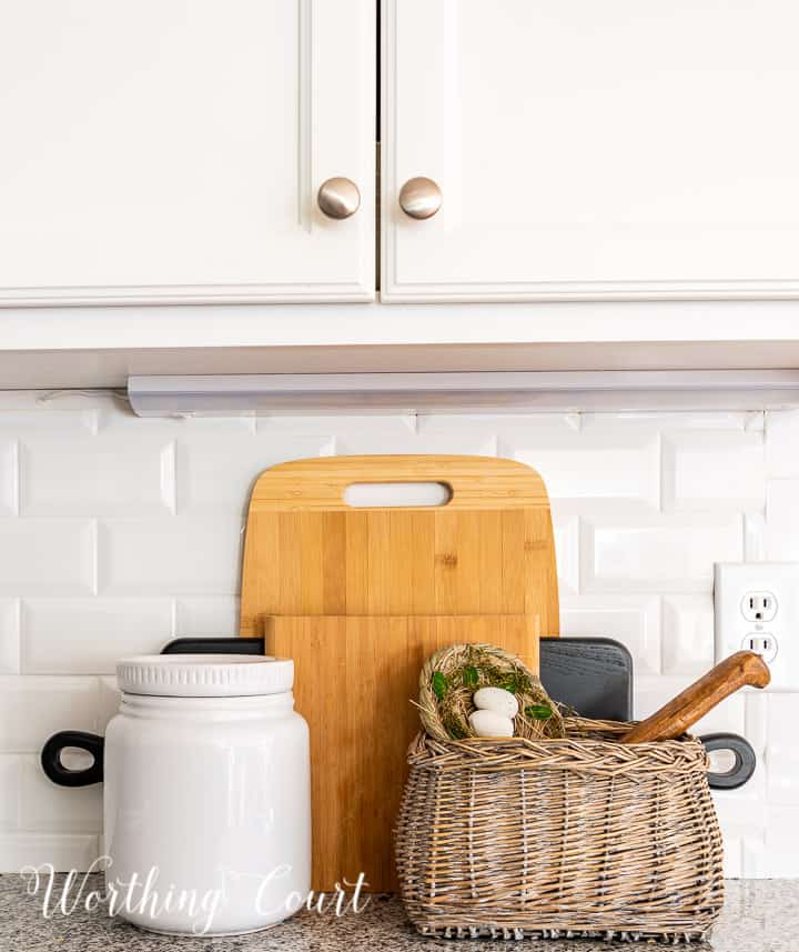 kitchen counter decorations against a white subway tile backsplash