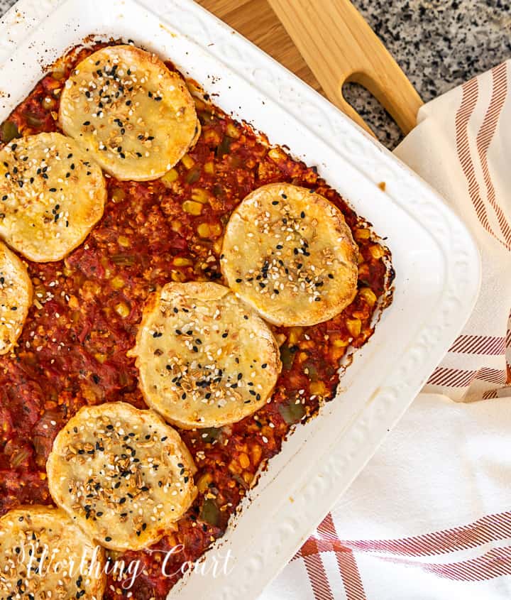 image of sloppy joe casserole topped with biscuits