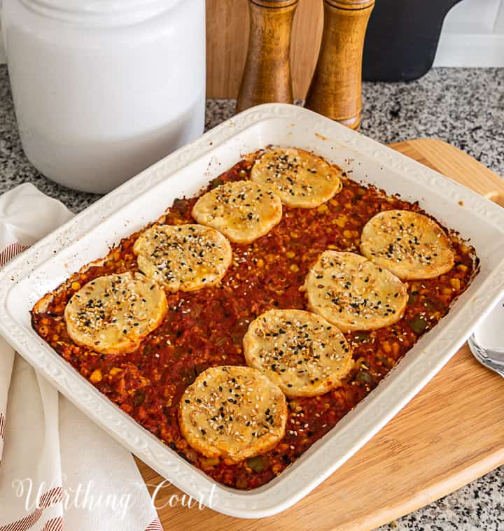 image of sloppy joe casserole topped with biscuits