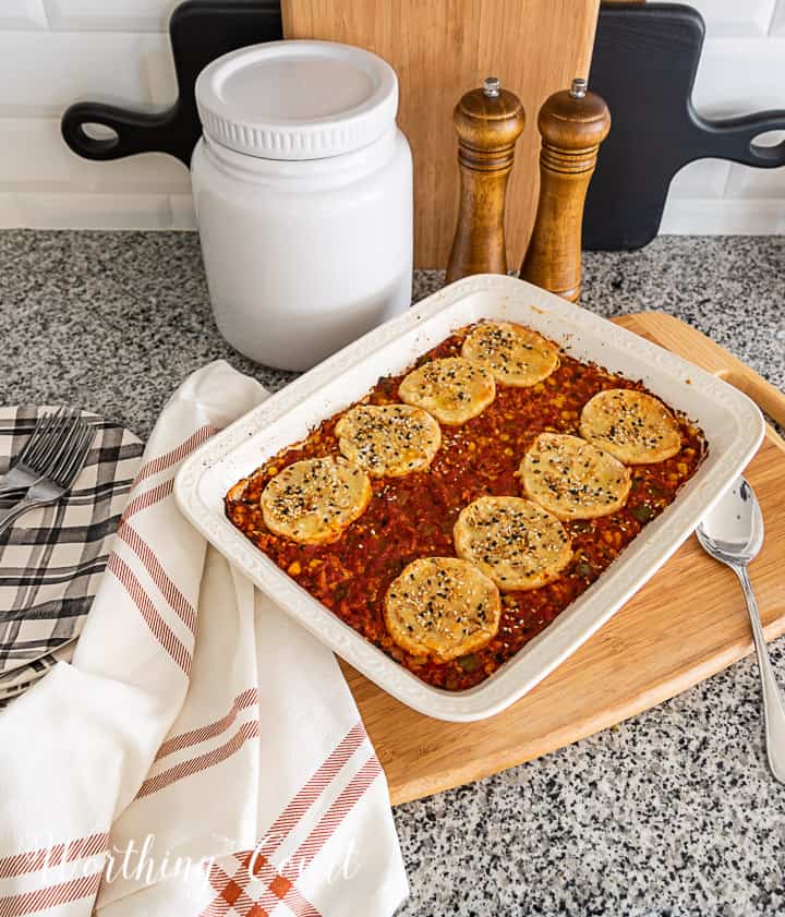 image of sloppy joe casserole topped with biscuits