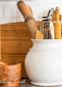 kitchen counter decorations against a white subway tile backsplash