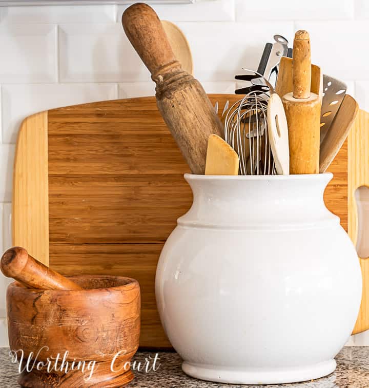 kitchen counter decorations against a white subway tile backsplash