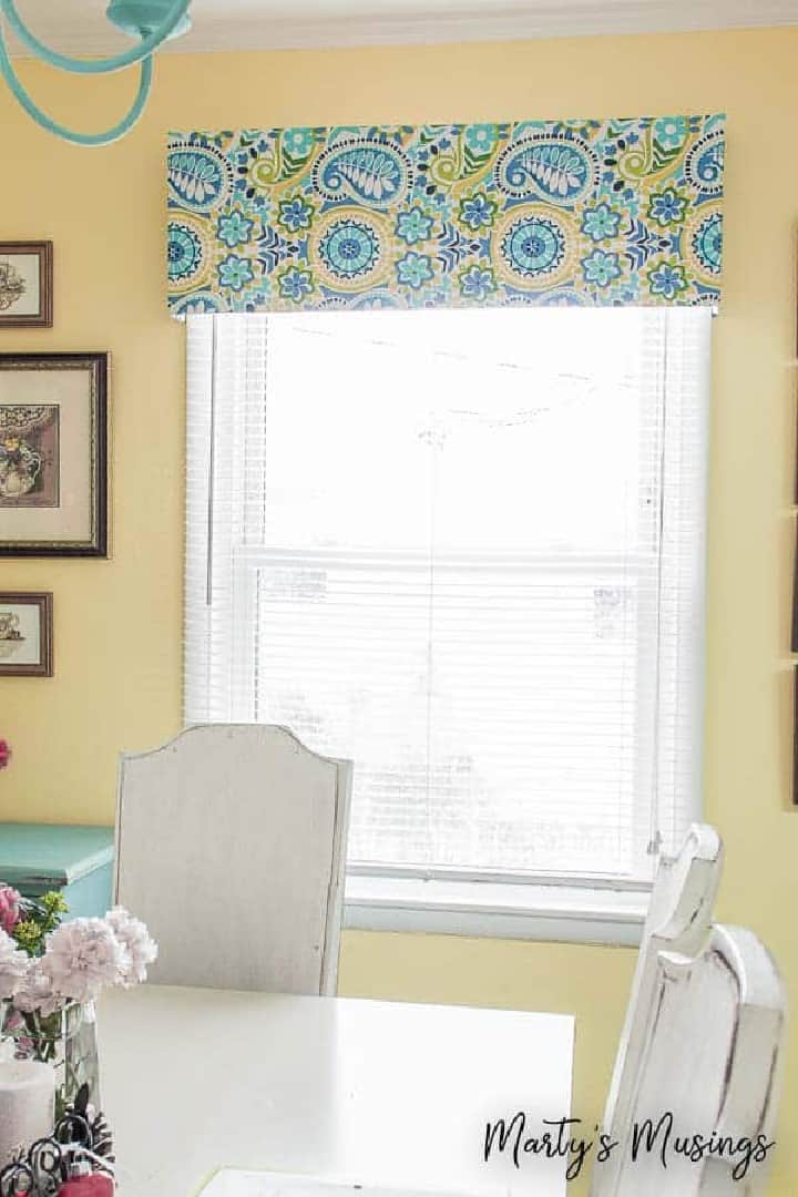 window valance with blue and yellow fabric