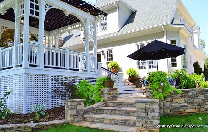 white deck with flagstone stairway