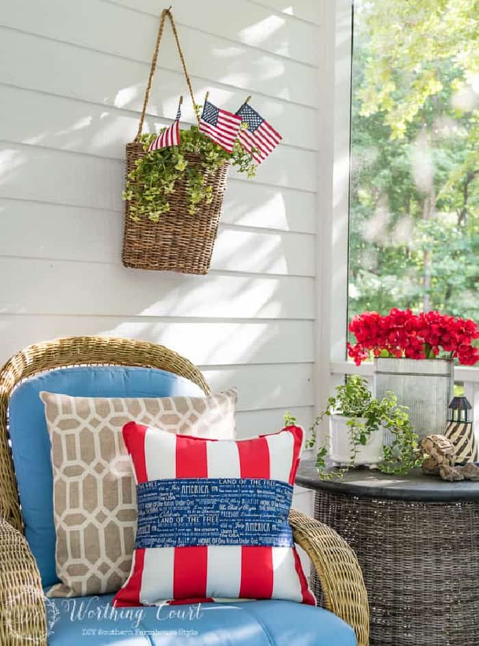 chair with blue cushions surrounded by patriotic decor