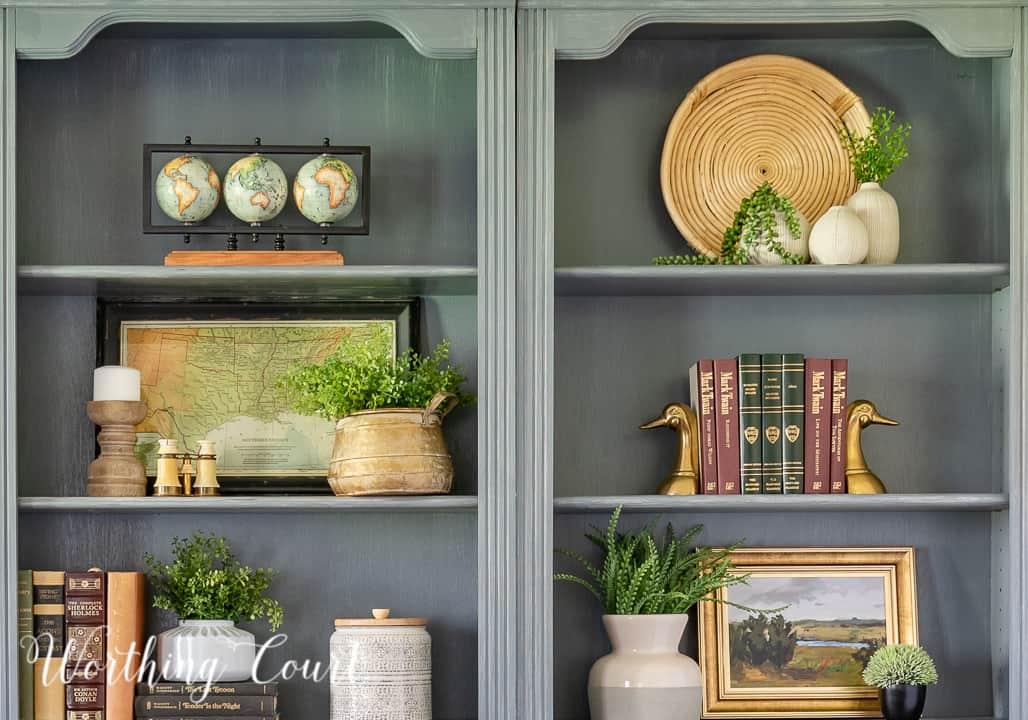 closeup of accessories on a pair of gray bookcases