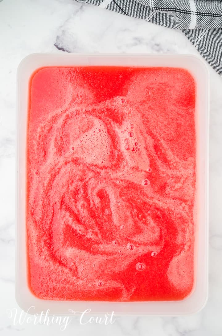 watermelon sorbet in a rectangular container before freezing