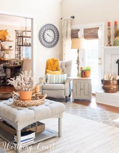 family room in neutral colors with fall decor