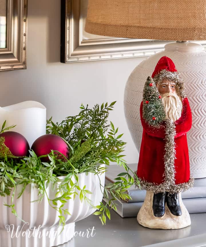 Santa figurine beside white bowl