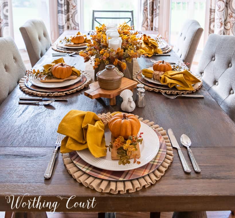 Thanksgiving tablescape using pumpkins and traditional fall colors