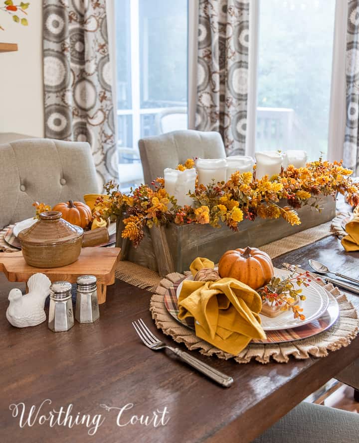 Thanksgiving tablescape using pumpkins and traditional fall colors