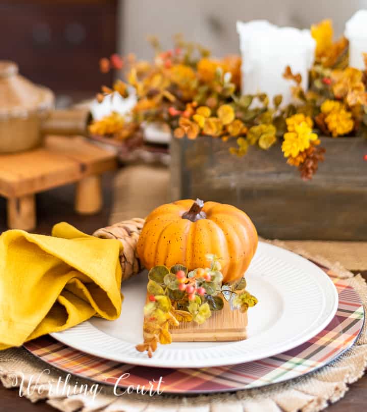Thanksgiving tablescape using pumpkins and traditional fall colors