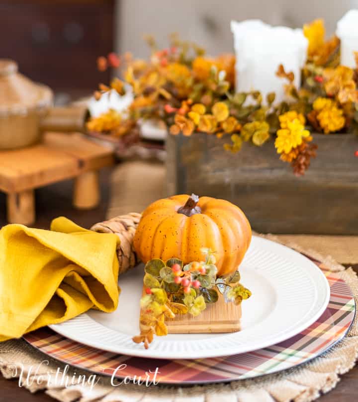 Thanksgiving tablescape using pumpkins and traditional fall colors