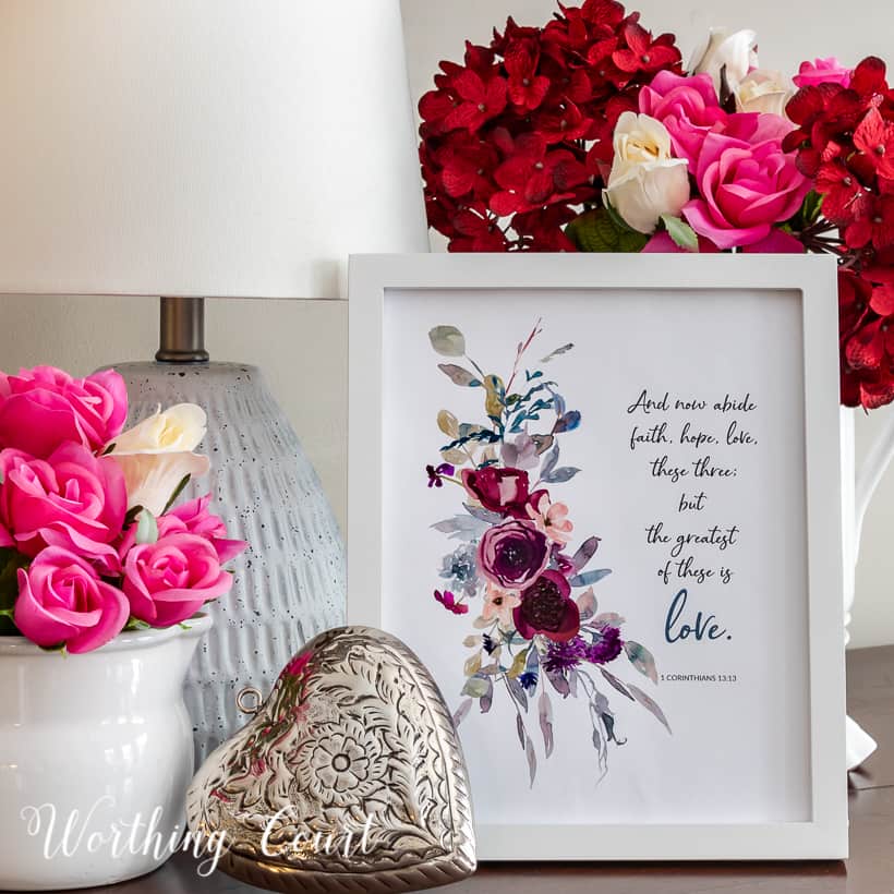 valentine's day vignette including a framed printable