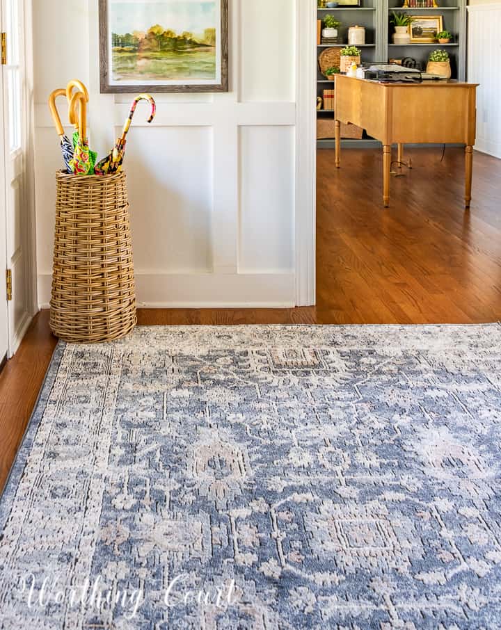 blue rug on a hardwood floor 
