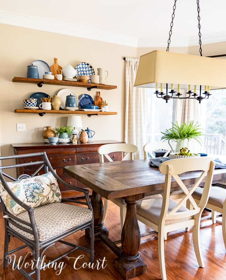 cottage style breakfast nook decorated for spring with blue and white accessories