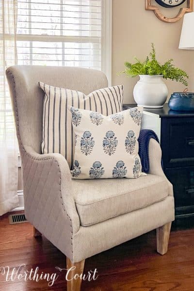 pillows in a gray arm chair