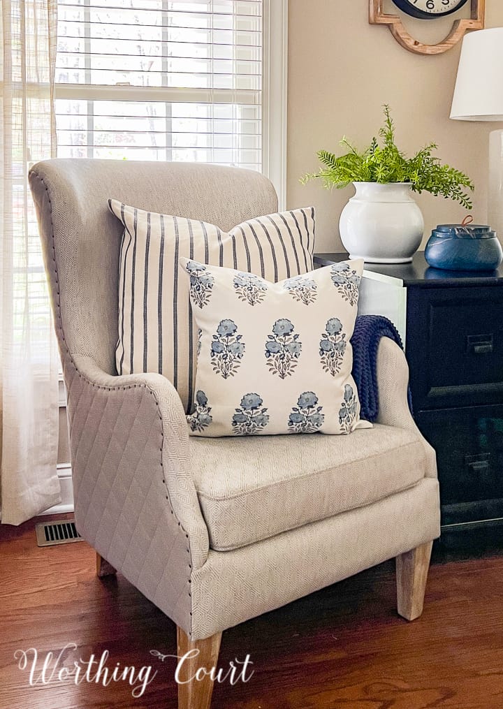 pillows in a gray arm chair