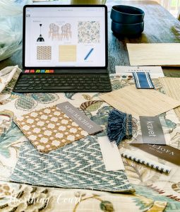 fabric and trim samples laying on a table