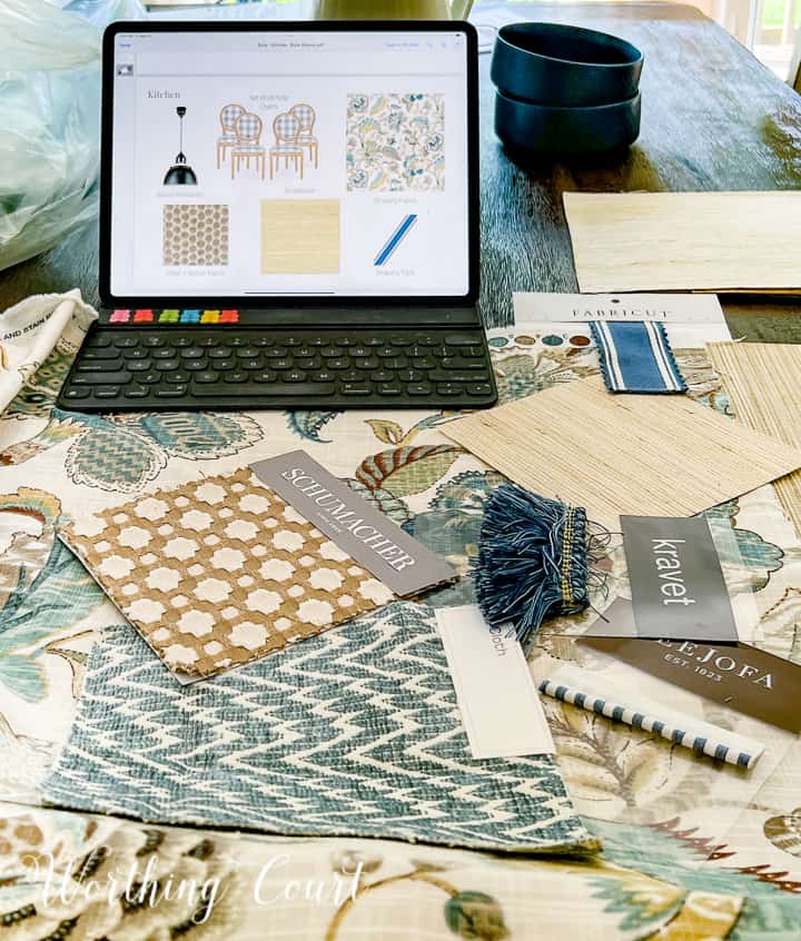 fabric and trim samples laying on a table