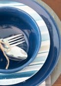 place setting with blue, white and gray plates