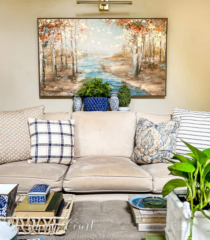 coffee table and sofa table with blue and white accessories