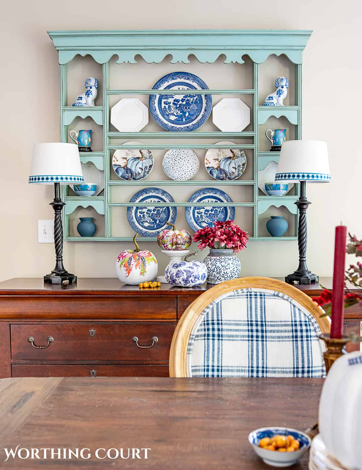how to decorate a plate rack using this blue wall mounted rack as an example