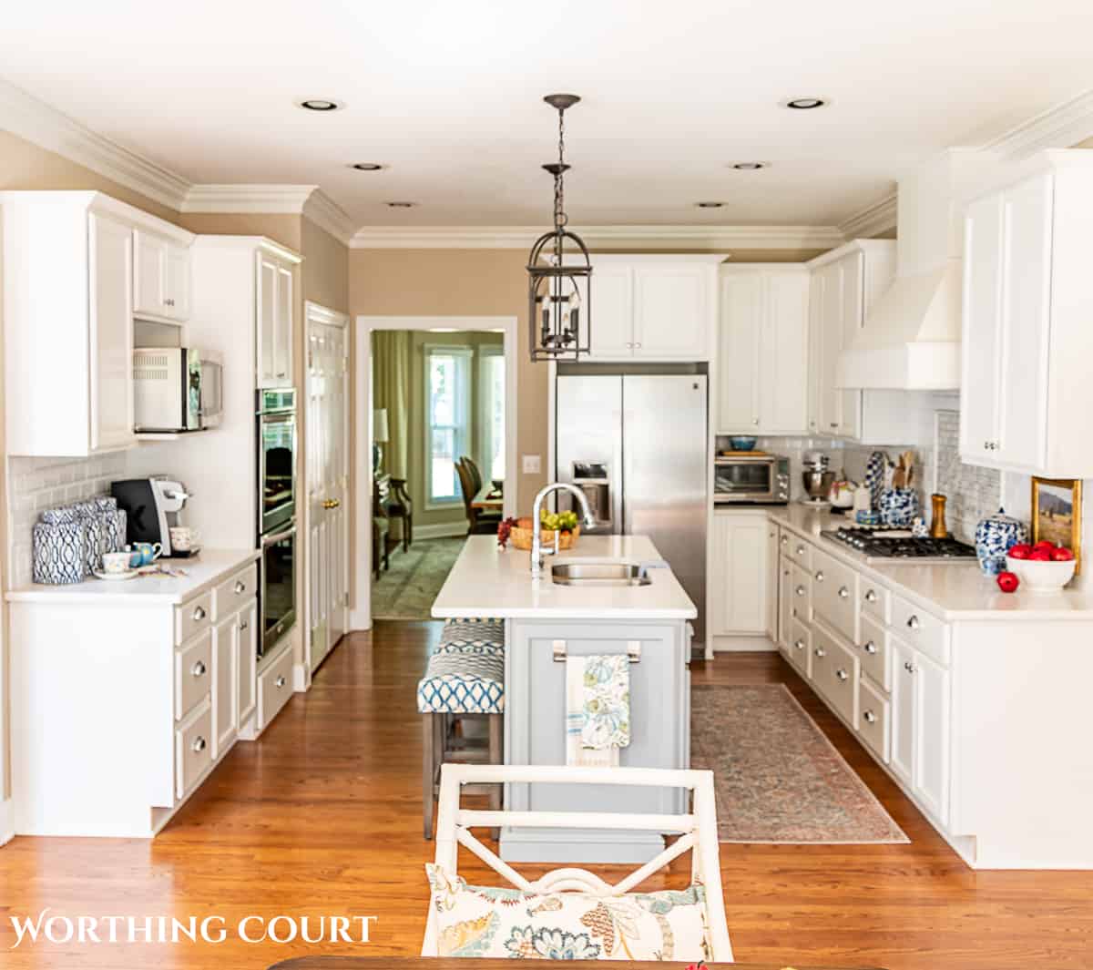 fall kitchen decorations in a kitchen with white cabinets