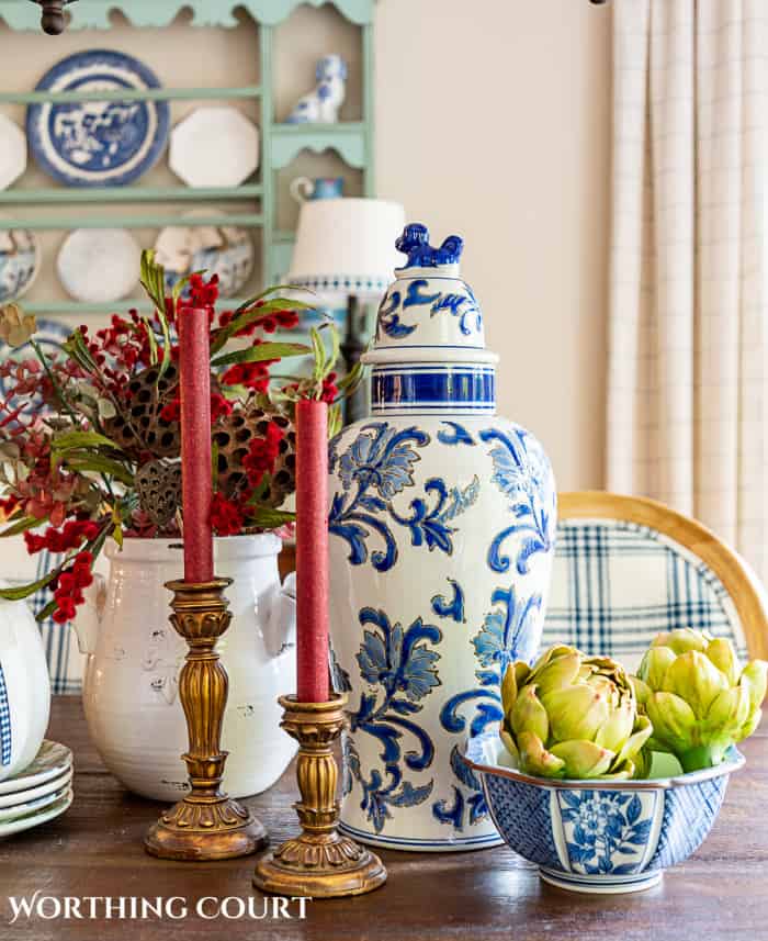 blue and white fall centerpiece with burgundy accents