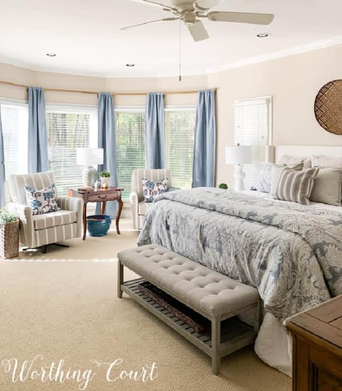 blue bay window treatment in a bedroom