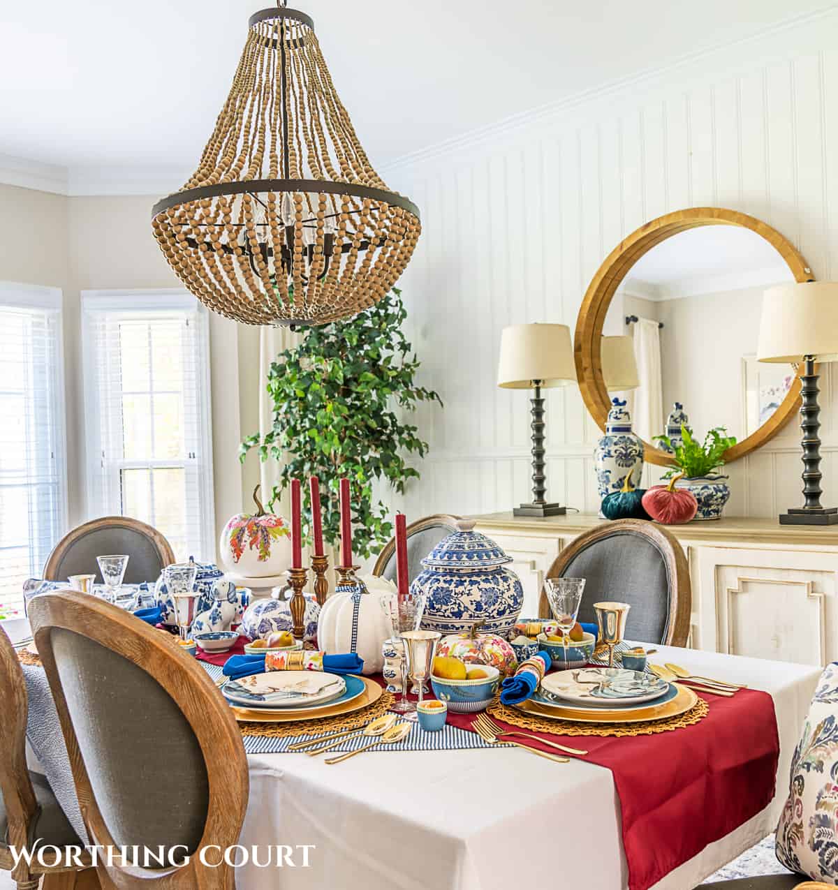 dining room table with gray chairs set for thanksgiving