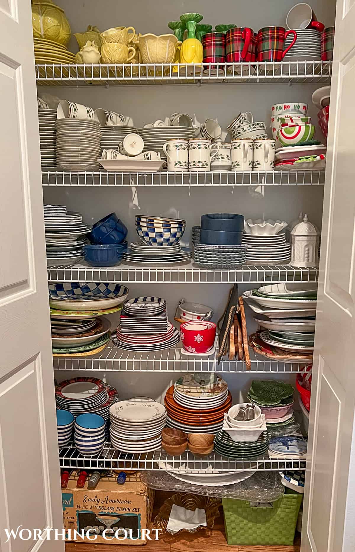 how to decorate a plate display rack with dishes from this dish closet