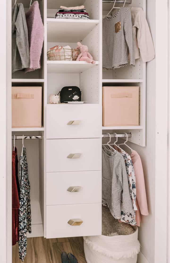 children's clothes organizer in a small closet
