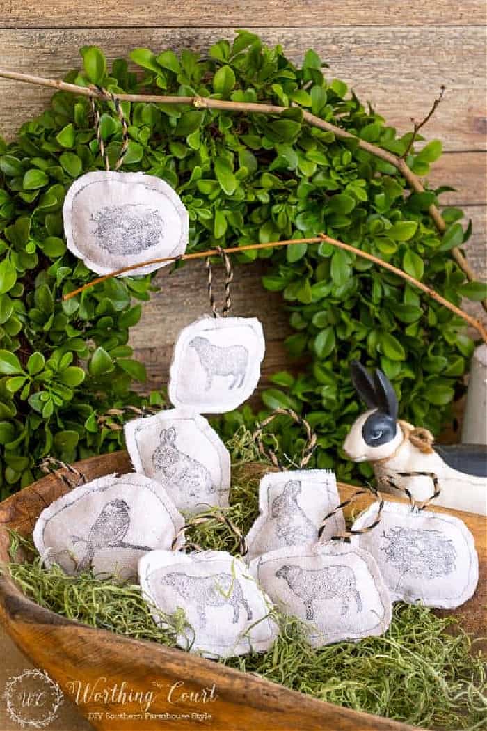 DIY Easter Ornaments in a wood bowl.