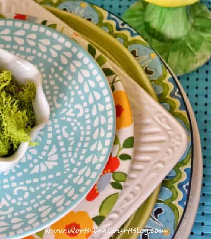 stack of dinner plates in spring colors