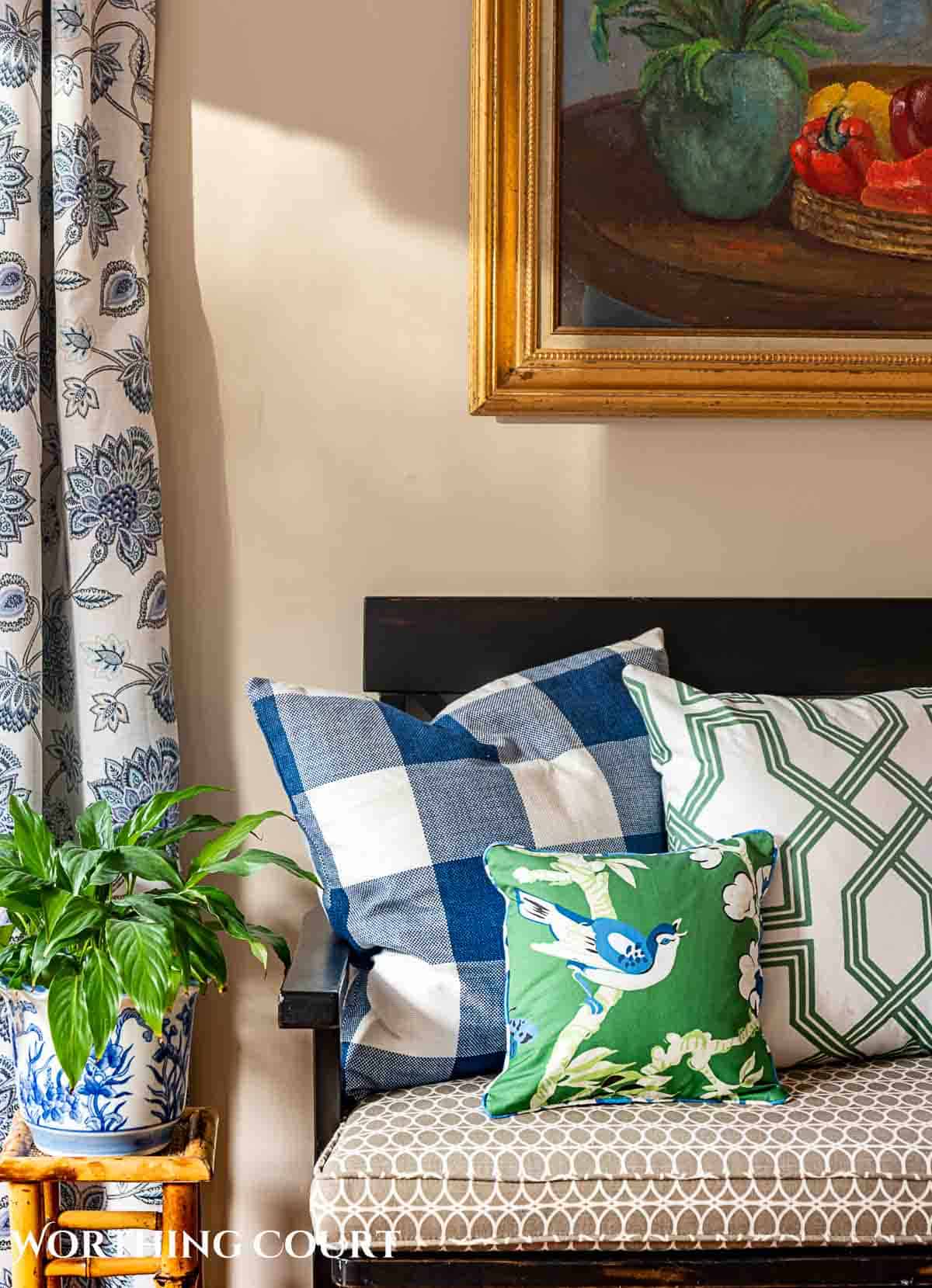 bench with blue and green throw pillows for spring