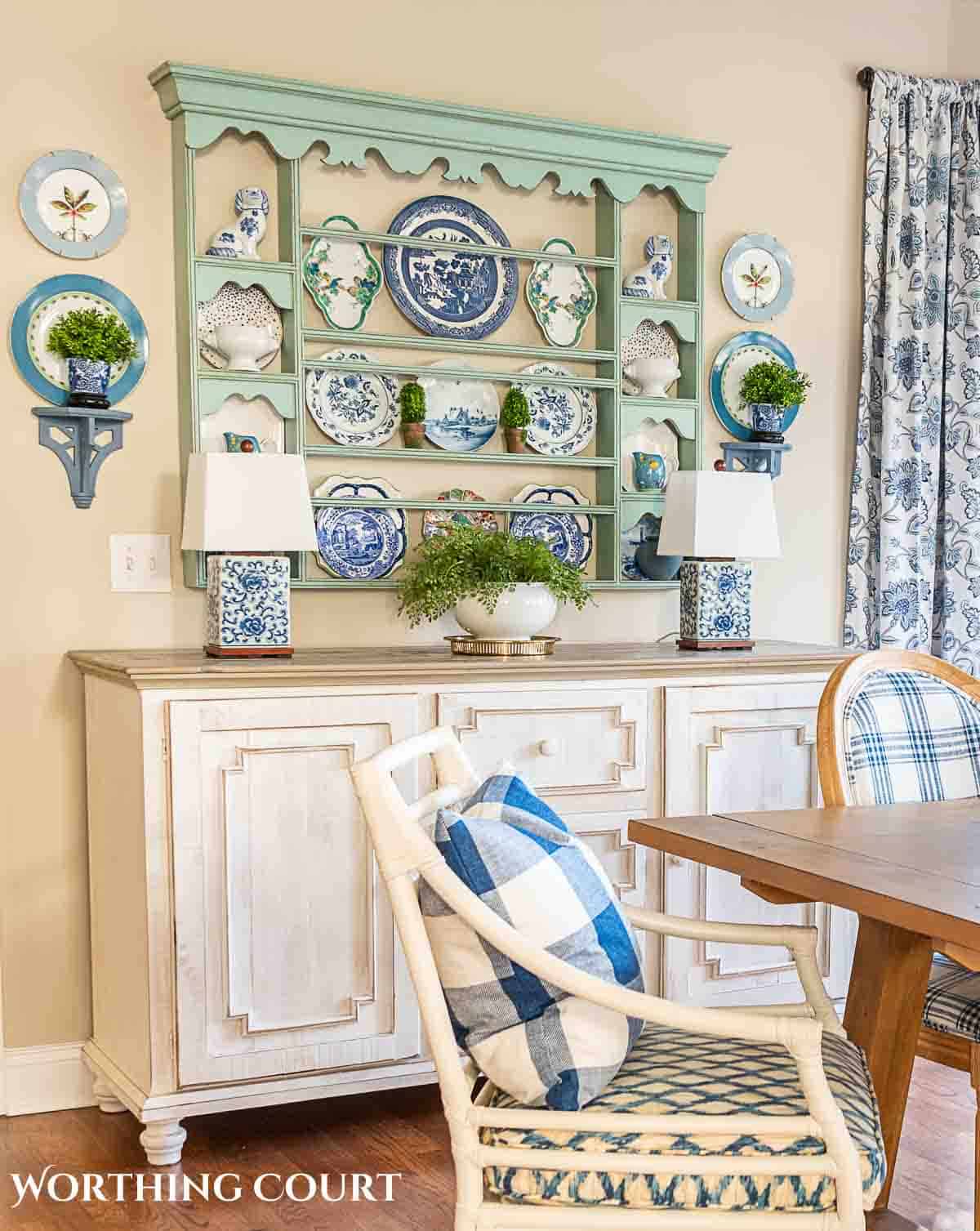 spring breakfast nook with blue and white accessories and cottage style furnishings