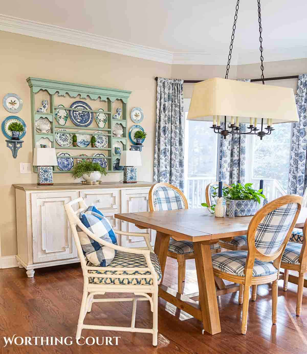 spring breakfast nook with blue and white accessories and cottage style furnishings