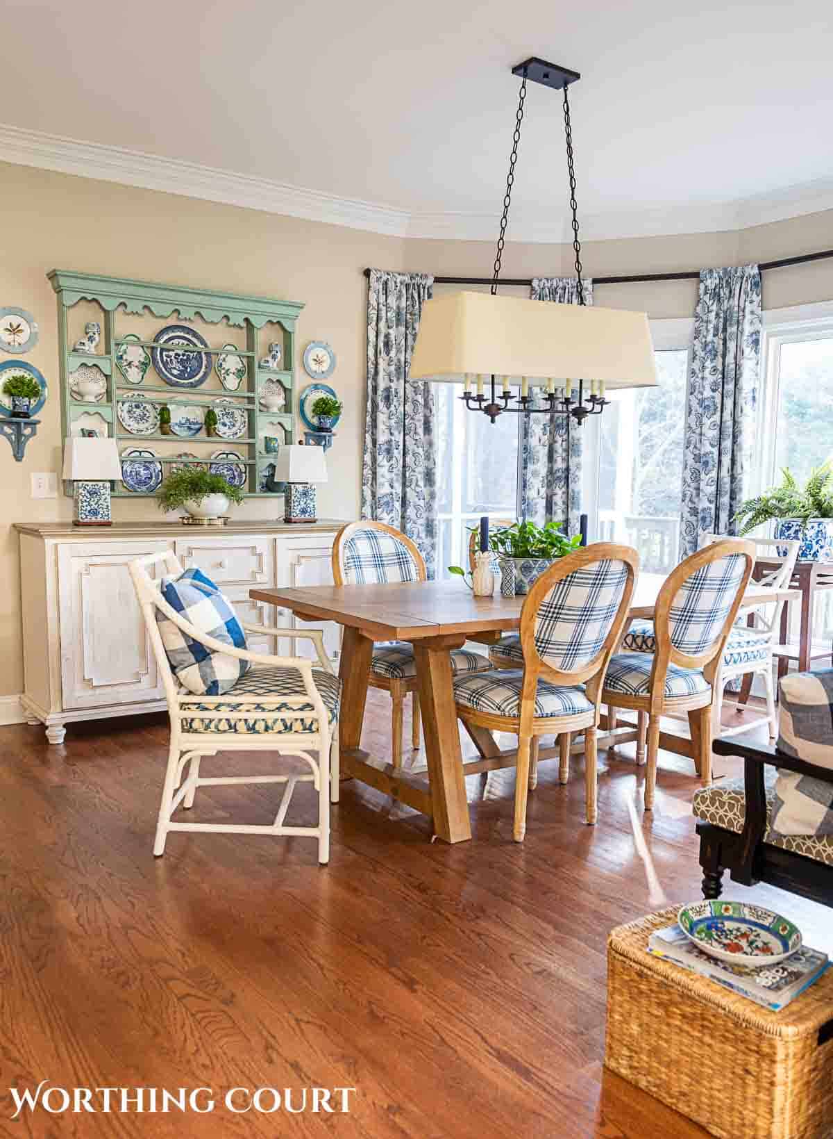 spring breakfast nook with blue and white accessories and cottage style furnishings