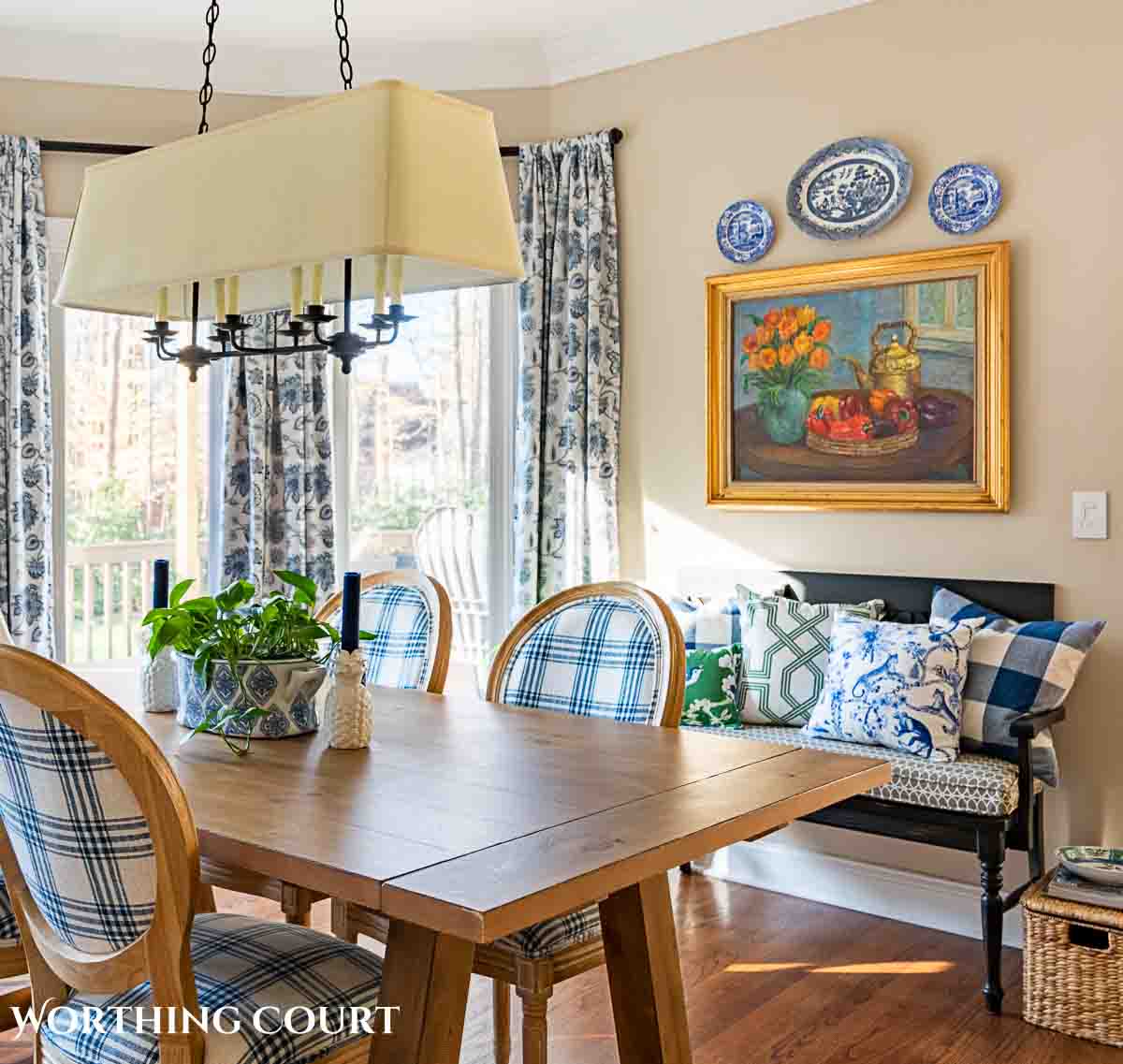 spring breakfast nook with blue and white accessories and cottage style furnishings