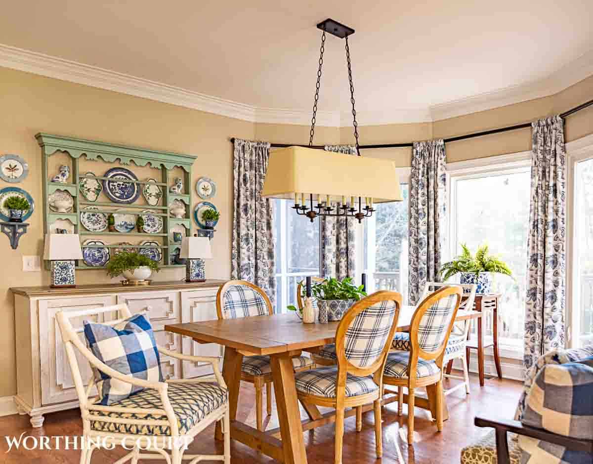 spring breakfast nook with blue and white accessories and cottage style furnishings