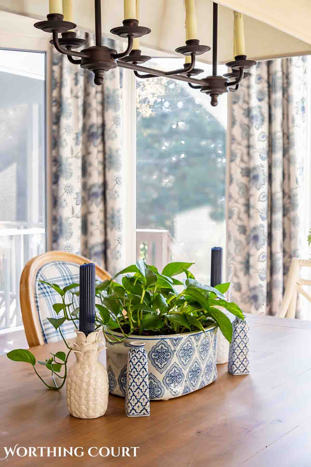 spring breakfast nook with blue and white accessories and cottage style furnishings