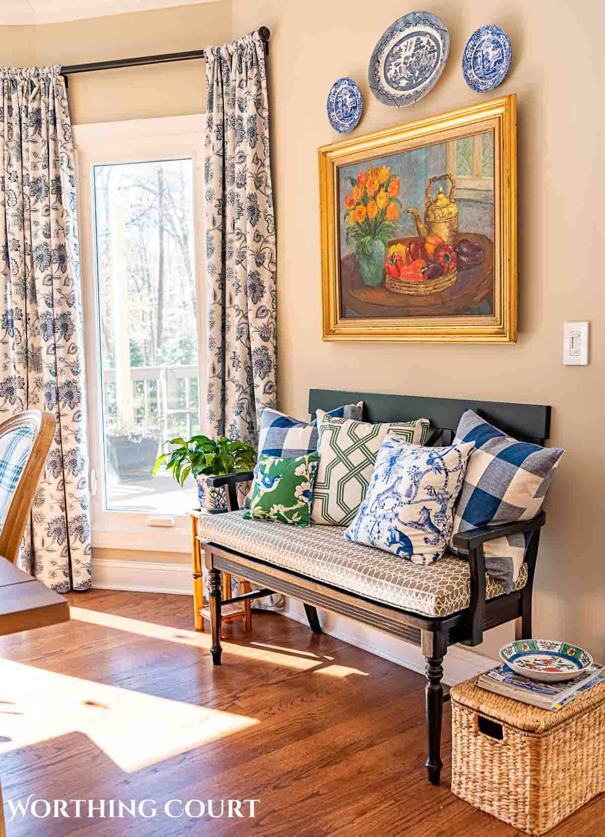 spring breakfast nook with blue and white accessories and cottage style furnishings