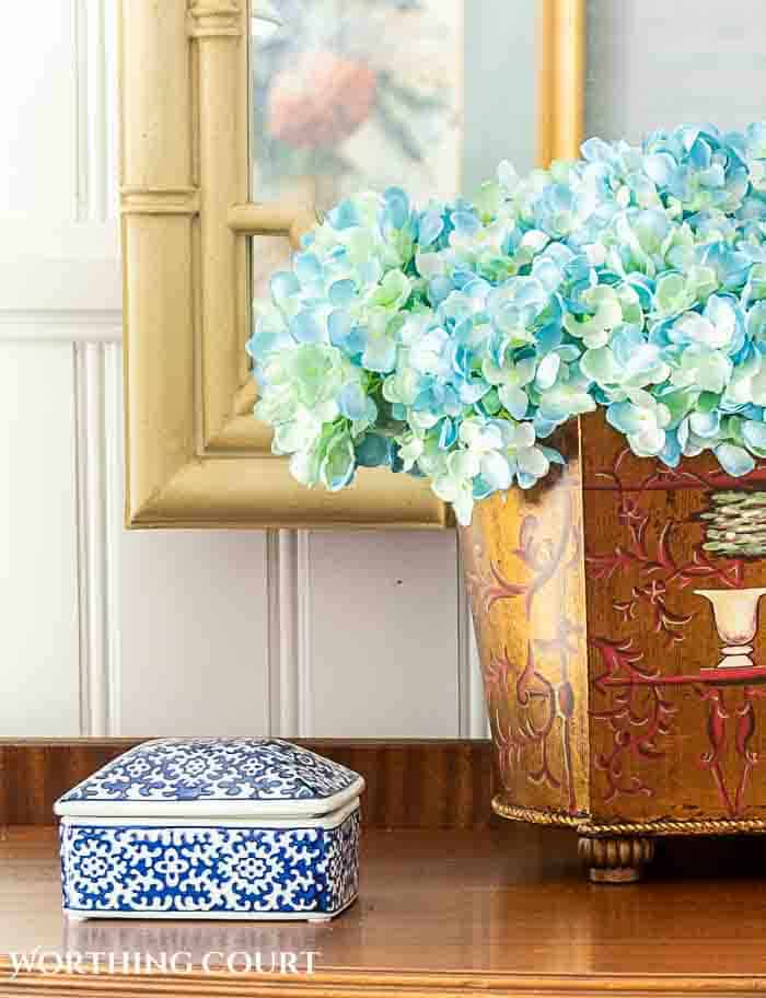 A mix of dried and fresh hydrangeas for a summer mantel