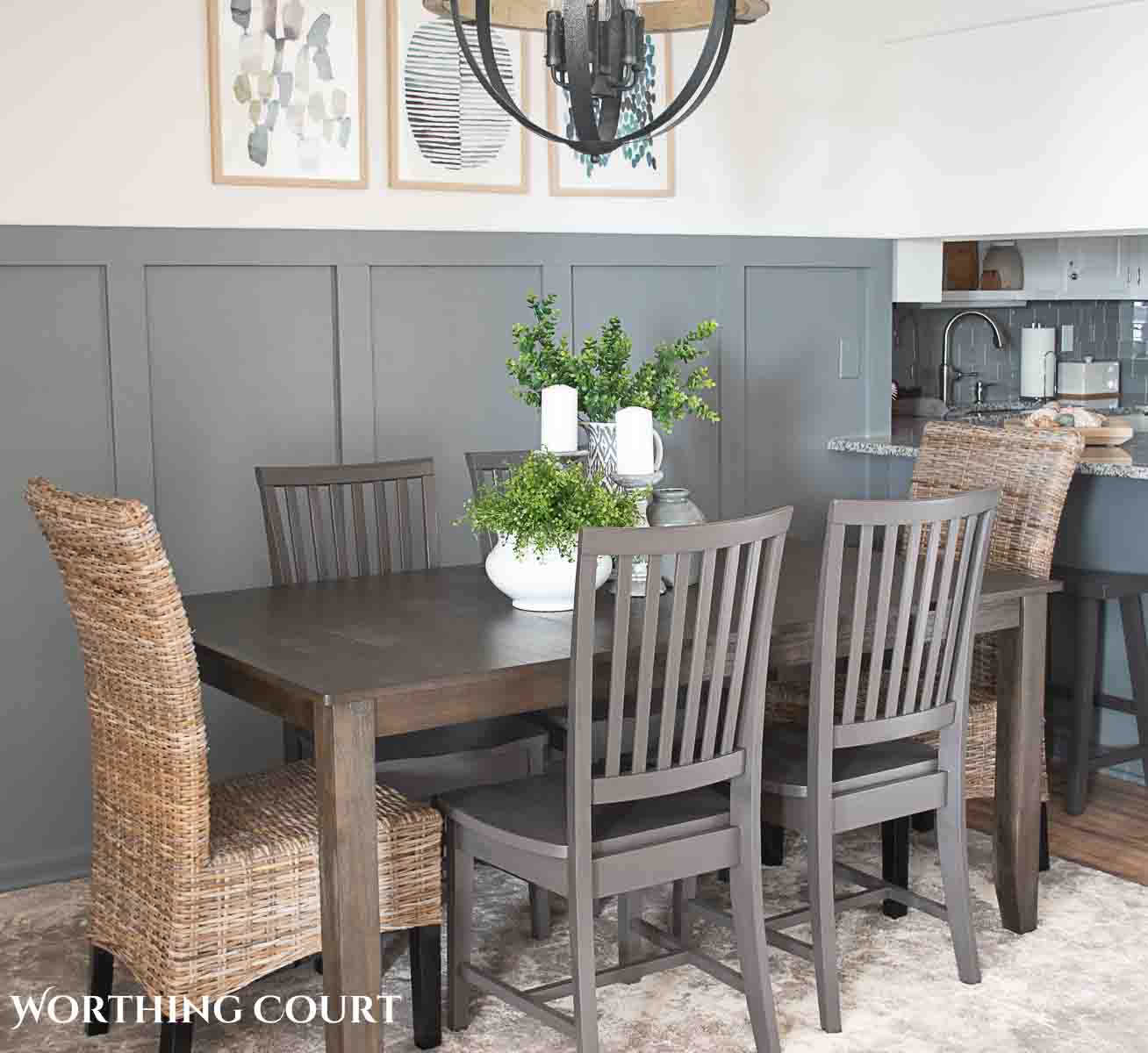 gray dining room table and chairs with wicker head chairs