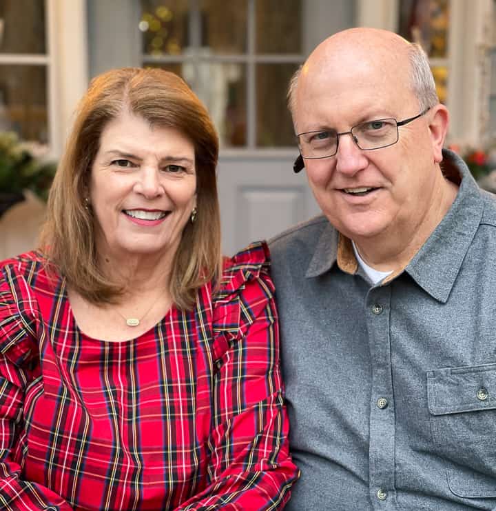 man and woman sitting on steps